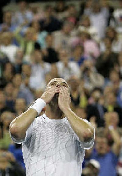 
After holding off Marcos Baghdatis, Andre Agassi blows kisses to the U.S. Open crowd. 
 (Associated Press / The Spokesman-Review)