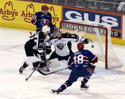 Spokane forward Filip Kral  scores the Chiefs’ first of three goals against Vancouver Giants goalie Trent Miner  in the first period  Friday  at the Arena. (Colin Mulvany / The Spokesman-Review)