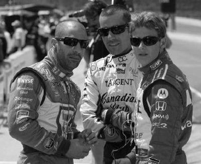 
Tony Kanaan, Dario Franchitti, and Marco Andretti (l-r) watch the action on the final day of Indy 500 qualifying.
 (Associated Press / The Spokesman-Review)