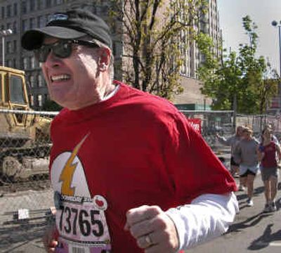 Doug Clark suffers through the first two blocks of Bloomsday.
(Dan Pelle / The Spokesman-Review)