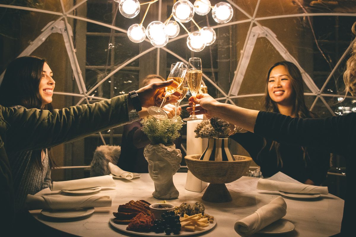 Luna is offering snow globe dining for the first time. There are two igloos on the patio, and dinner service is offered one time per evening in each globe.  (Chloe Siok)