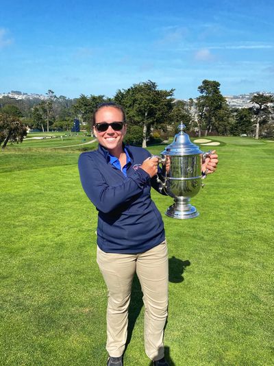 Hayden Lake Country Club assistant superintendent Jessica Lenihan poses with the U.S. Women’s Open trophy at the Olympic Club in San Francisco.  (Courtesy of Jessica Lenihan)