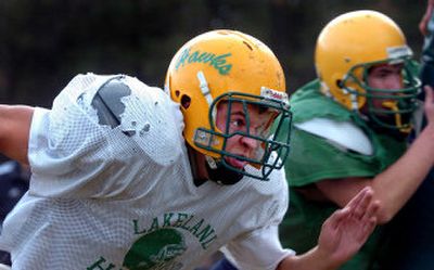 
Determination has helped Lakeland senior Josh Wuest overcome his average football size (5-foot-11, 185 pounds) to become the Hawks' starting guard and linebacker. 
 (Jesse Tinsley / The Spokesman-Review)