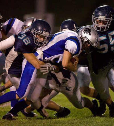 
LC seniors Billy Clifford, left, and Sean Jolin are key parts of tough defense. Special to 
 (Bruce Twitchell Special to / The Spokesman-Review)