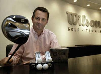 Angus Moir, Wilson Sporting Goods Co.'s global business director for golf, poses with the new Wilson Staff Brand in Chicago.
(Associated Press / The Spokesman-Review)