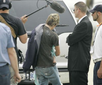 
Anna Nicole Smith's ex-boyfriend Larry Birkhead,  carries  their daughter, Dannielynn,  in Louisville, Ky. 
 (Associated Press / The Spokesman-Review)