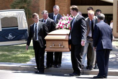 
Pallbearers carry the casket of Robin Blasnek in Mesa, Ariz., on Saturday. Blasnek, who was shot July 30, allegedly was a victim of serial killing suspects Dale Hausner and Samuel Dieteman. 
 (Associated Press / The Spokesman-Review)