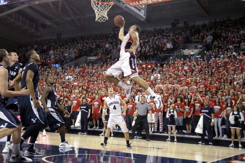 Bringman Young's defense can only watch as Gonzaga's Elias Harris (20) goes for the dunk as teammate Kevin Pangos (4) watches, in the second half of an NCAA college basketball game, Thursday, Feb. 23, 2012, in Spokane, Wash. Gonzaga beat BYU 74 to 63. (Jed Conklin / Fr170252 Ap)