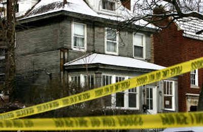 
Yellow police tape surrounds the home of U.S. District Judge Joan Humphrey Lefkow on Tuesday in Chicago. 
 (Associated Press / The Spokesman-Review)