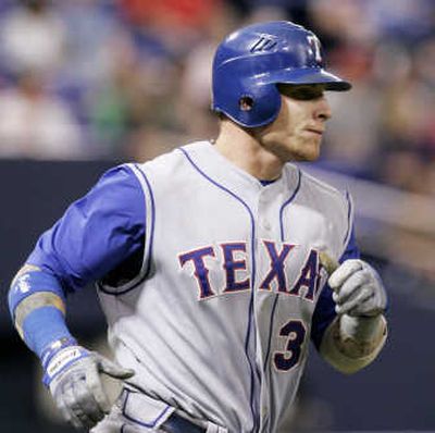 
Texas' Josh Hamilton leads the majors in RBIs and is close to the top in home runs and batting average. Associated Press
 (Associated Press / The Spokesman-Review)