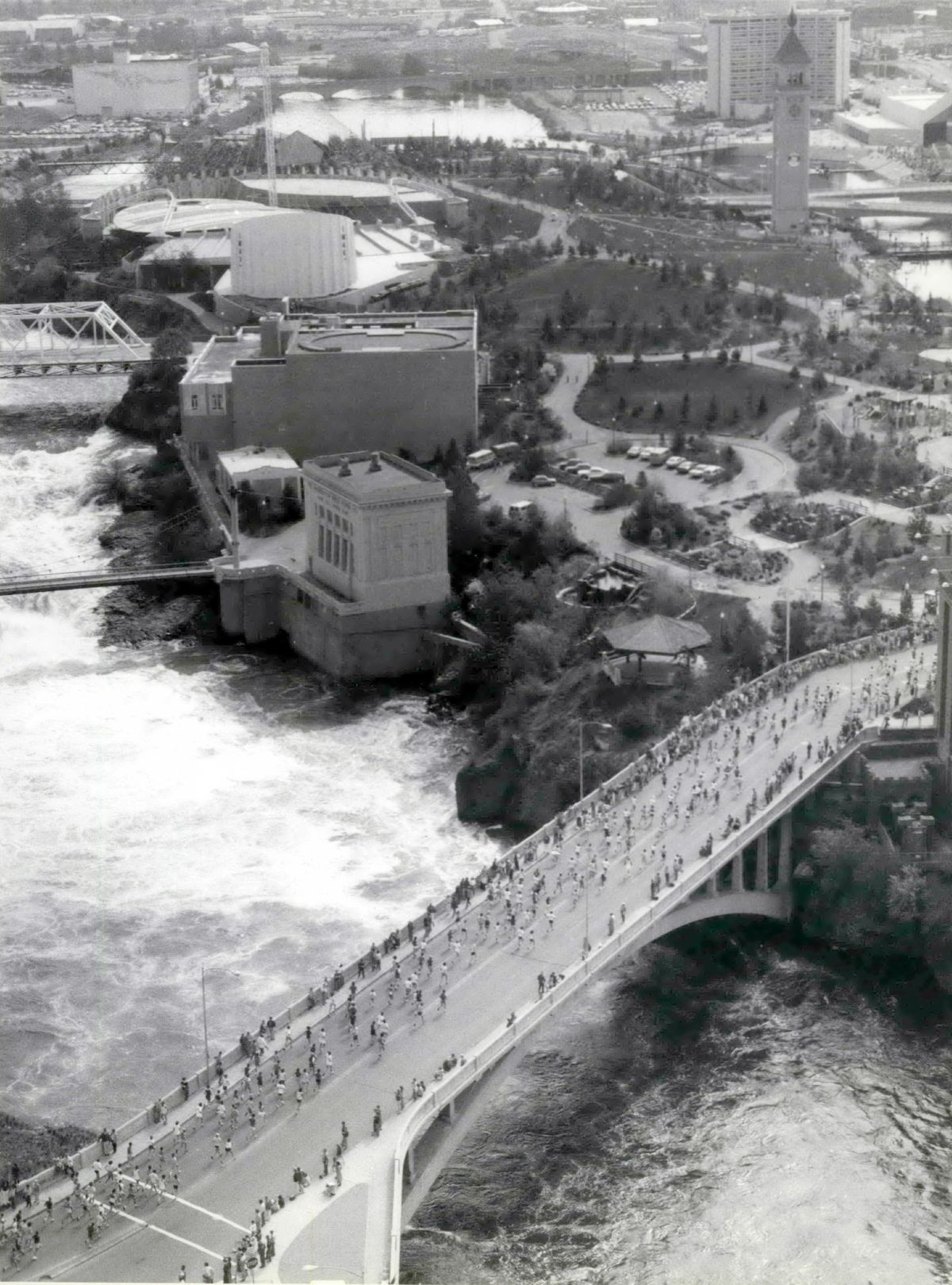 Bloomsday runners cross the Post Street Bridge on the edge of Riverfront Park during the 1981 race in Spokane, Washington. It was the fifth year of the 12K race that was quickly becoming the premiere road race in the nation, though there was no money offered to the winners until a year later. (Don Jamison/THE SPOKESMAN-REVIEW / Cowles Publishing)