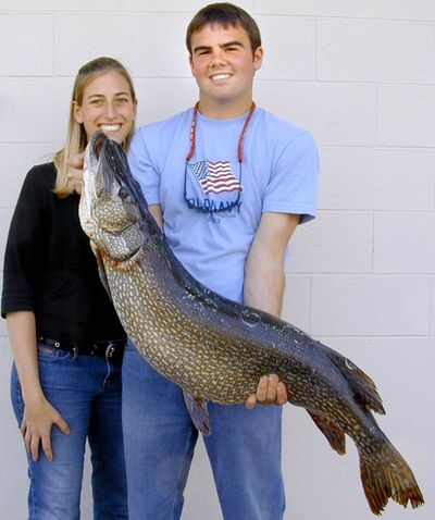 Bryan McMannis, of Newman Lake, and his fishing partner, Emily Wuitschick, pose with the 34.06-pound Washington state record northern pike that McMannis caught while they were fishing on Lake Spokane on April 9, 2004. (Washington Fish and Wildlife Dept. / Courtesy photo)