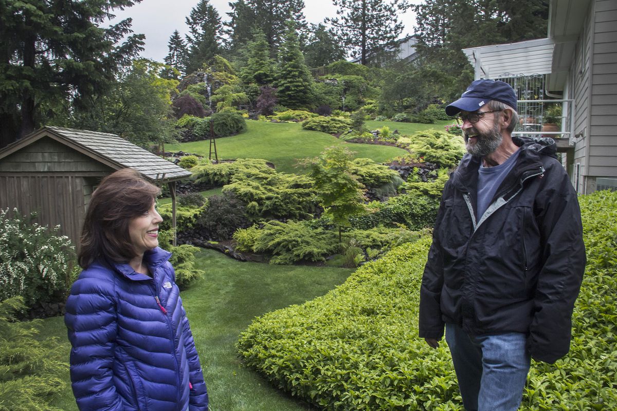 Claudia Lowry and Bob Bloem have been working on Lowry’s Hayden garden for about 10 years. (BRUCE TWITCHELL)