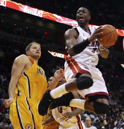 Miami’s Dwyane Wade slashed through the Pacers for 38 points.  (Associated Press / The Spokesman-Review)