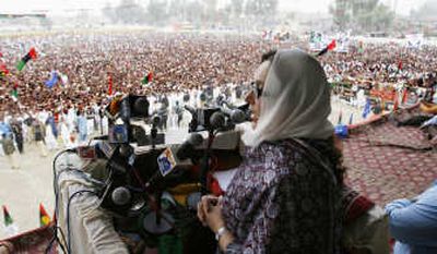 
Fformer Prime Minister Benazir Bhutto addresses supporters in Larkana, Pakistan, on Sunday. Associated Press
 (Associated Press / The Spokesman-Review)