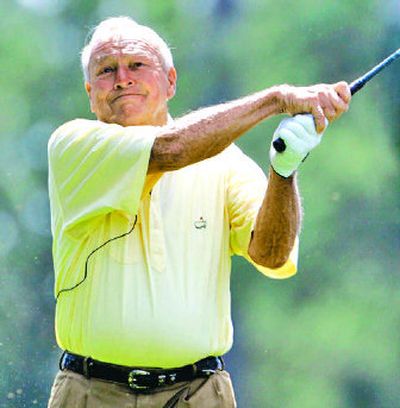 Arnold Palmer hits from the first tee during the Par 3 contest on Wednesday.
(Associated Press / The Spokesman-Review)