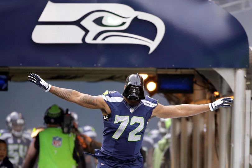 Seattle Seahawks defensive end Michael Bennett, donning a “Darth Vader” mask before the Cleveland game in December, says the Seahawks just needed time to get back into form this season. (Ted Warren / Associated Press)