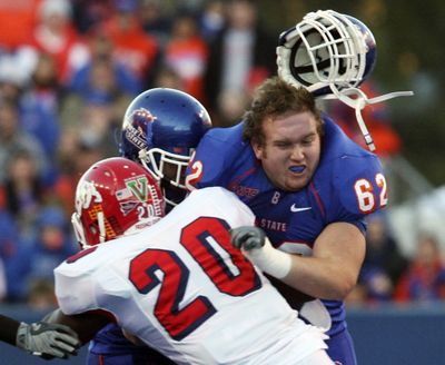 Boise State’s Kevin Sapien throws a block against Fresno State on Friday.  (Associated Press / The Spokesman-Review)