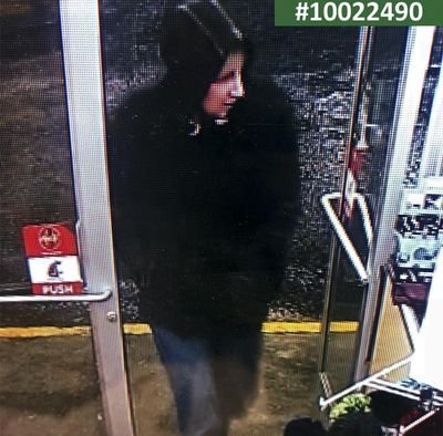 Deputies are asking for the community’s help in identifying the suspect from an alleged gas station market robbery Sunday night in Chattaroy, who was caught on camera. (Courtesy Spokane County Sheriff’s Office)