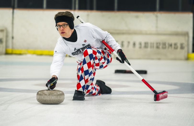 During curling practice at the Riverfront Park Ice Palace, Josh Engle throws a stone. For the first time in 30-some years, Spokane has a curling league. The new league is full of new curlers, with 80 percent of participants having never curled before. (Colin Mulvany)