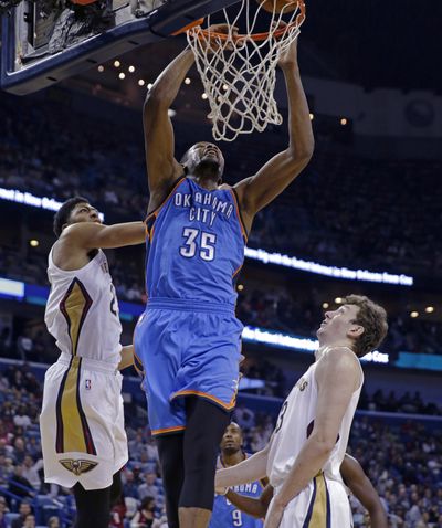 Kevin Durant scored 27 points in his first game this season. (Associated Press)
