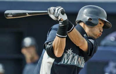 
Seattle's Ichiro Suzuki watches his base hit against the San Francisco Giants in the first inning Thursday. Associated Press
 (Associated Press / The Spokesman-Review)