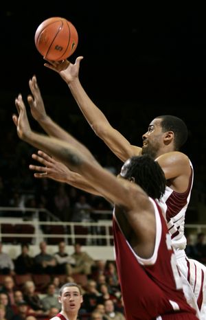 Stanford forward Lawrence Hill  gets two of this game-high 20 points.  (Associated Press / The Spokesman-Review)