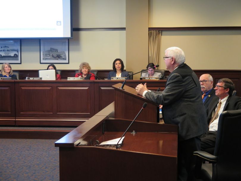 Montana state Rep. Mike Cuffe, joined by Matt Morrison, executive director of the Pacific Northwest Economic Region, and Washington state Sen. Arnie Roblan address the House Environment Committee on Thursday, Jan. 18, 2018 about invasive quagga and zebra mussels. (Betsy Z. Russell)