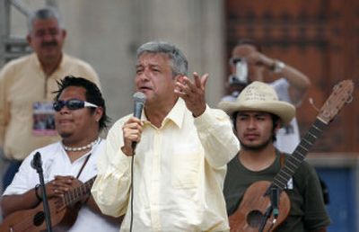 
Mexican presidential candidate Andres Manuel Lopez Obrador speaks to supporters Monday at Mexico City's main Zocalo plaza. 
 (Associated Press / The Spokesman-Review)