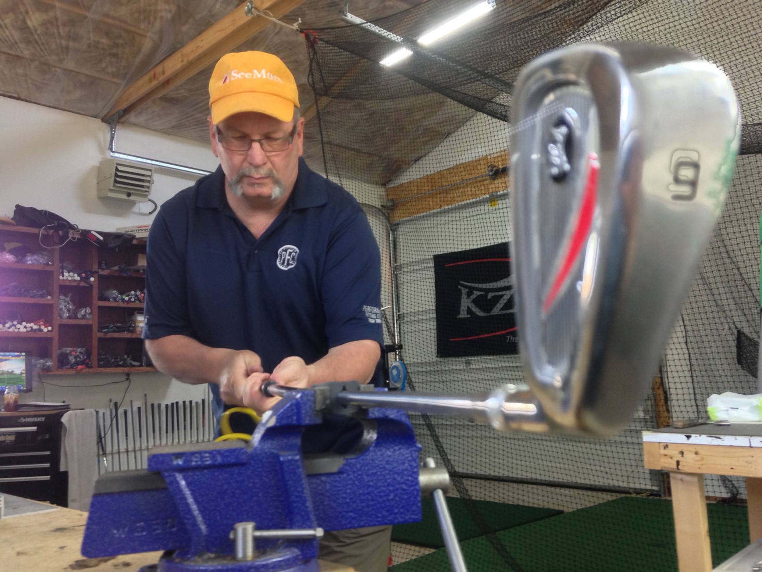 Area golf fitter Kelly Crumpler uses hightech equipment to help