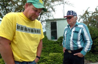
Farmers Randy, left, and Larry Peterson talk outside Bonners Ferry City Hall about the flood-caused crop damage in their fields. 
 (Jesse Tinsley / The Spokesman-Review)