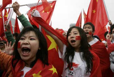 
Chinese students await the Olympic torch's arrival at Olympic Park in Seoul, South Korea. Associated Press
 (Associated Press / The Spokesman-Review)