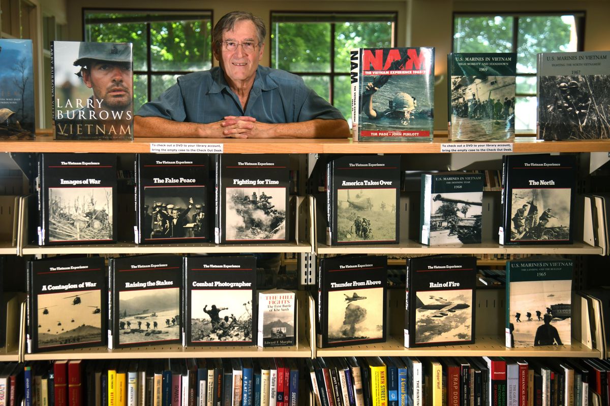 Larry Plager, a Vietnam veteran from Medical Lake, recently donated hundreds of books and materials about the war to the Foley Center Library at Gonzaga University.  The collection is on display as part of a grant the university received to tell stories  about war. (Dan Pelle / The Spokesman-Review)