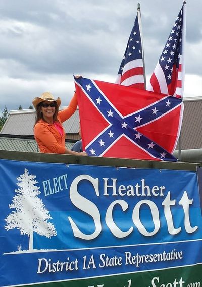 In this Facebook photo that was posted on her personal and legislative Facebook pages, Heather Scott proudly displays the Confederate flag at Priest River Timber Days in July.