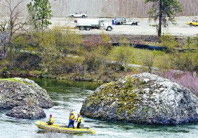 
Grading continues Thursday at the Coyote Rock subdivision, near the Denny Ashlock Bridge on the Spokane River. A hearing was held Thursday concerning a permit required for work that will occur within 250 feet from the river. The hearing examiner will make a decision in a couple of weeks. 
 (J. BART RAYNIAK / The Spokesman-Review)