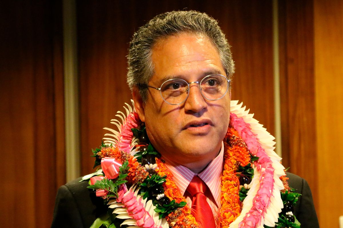 FILE - Senate Majority Leader J. Kalani English speaks to reporters on opening day of the state Legislature at the state Capitol in Honolulu, Jan. 16, 2019. Former Hawaii state Sen. English took bribes, including at least $15,000 cash and Las Vegas hotel rooms in exchange for shaping cesspool legislation that would benefit a business owner, according to federal allegations filed in court on Tuesday, Feb. 8, 2022.  (Audrey McAvoy)