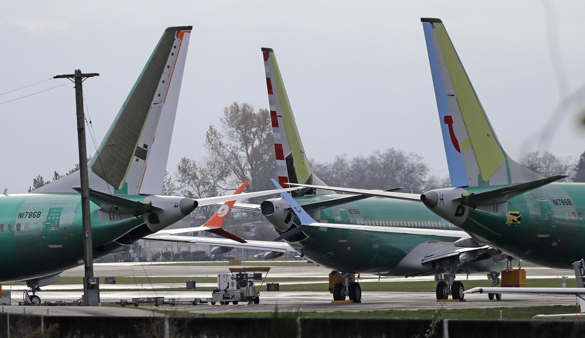 In this Nov. 14, 2018, file photo, Boeing 737 MAX 8 planes are parked near Boeing Co.’s 737 assembly facility in Renton, Wash. (Ted S. Warren / AP)