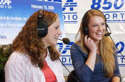 
 Jo Zellitti, left, and Taylor Ostergaard share a laugh as they do a sound check before going on the air on 