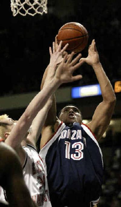 
Gonzaga's J.P. Batista, right, shows his strength inside during last month's game with Eastern Washington at the Arena. 
 (Associated Press / The Spokesman-Review)