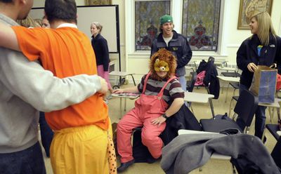 Jeff Rogers wears his bear costume and waits for his turn on stage Thursday  at Gonzaga University while rehearsing for “The Jungle Book.” The Specialized Recreation program at GU works with adults with developmental disabilities  to put on theater productions.  (CHRISTOPHER ANDERSON / The Spokesman-Review)