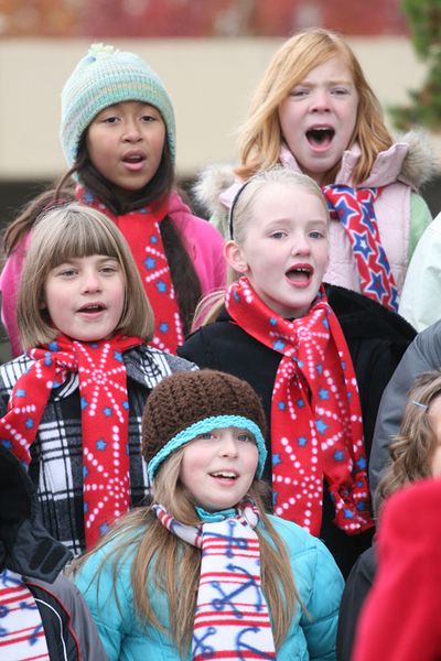 Winton Elementary students sing at Sunday�s Veterans Day ceremony in Coeur d�Alene. Clockwise from top left, Alivia Buchen, Willow Witkowski, Stephanie Kaschmitter, Sierra Holt and Danika Nowak. (Bill Buley/press)