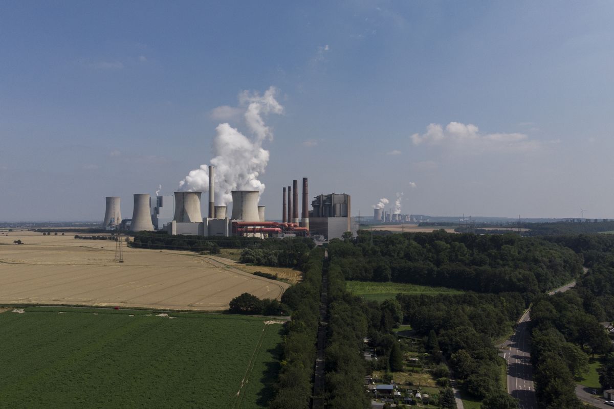 A view of a power plant in the town of Frimmersdorf, Germany, Tuesday, July 20, 2021. Last week