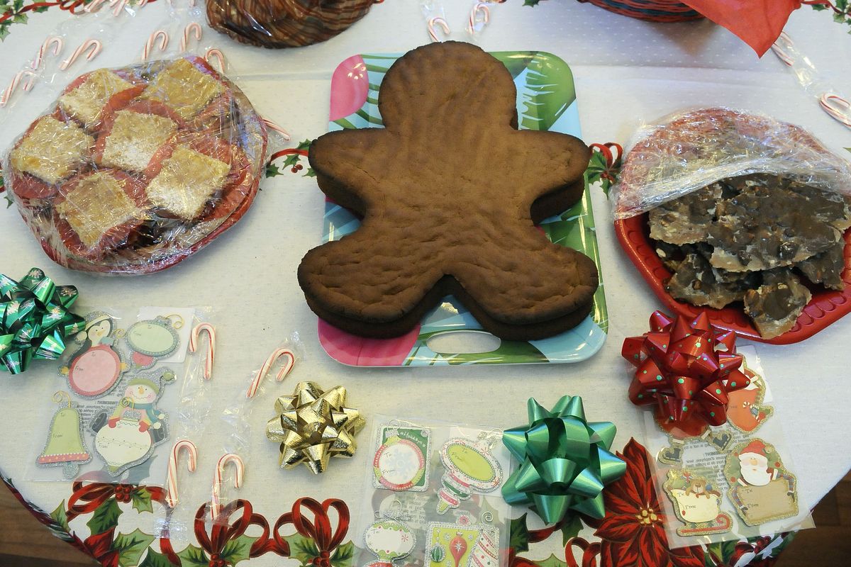 Linda Meyer organizes a Meet Up group called CDA What’s Cooking. She demonstrated how to make holiday gifts from the kitchen including lemon bars, gingerbread and Almond Roca at her home near Rathdrum, Idaho. (Dan Pelle)