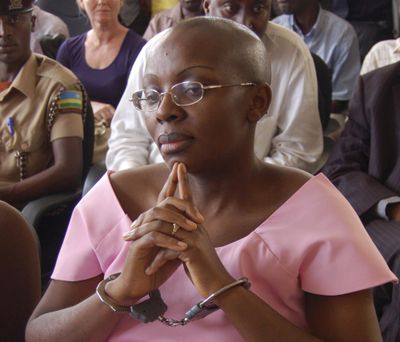 Rwandan opposition leader Victoire Ingabire wears handcuffs as she listens to the judge during her trial Sept. 5, 2011, in Kigali, Rwanda. Ingabire, one of Rwanda’s most prominent opposition leaders, walked free on Saturday, Sept. 15, 2018 after the government approved the early release of more than 2,100 prisoners with little explanation. (Shant Fabricatorian / Associated Press)
