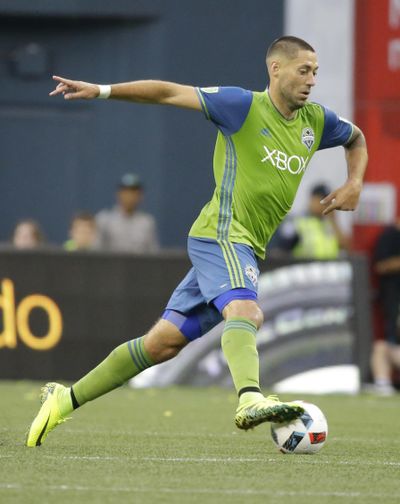 Sounders forward Clint Dempsey, shown in a file photo, was a full participant on Tuesday as the team opened training camp. Dempsey missed Seattle’s title run last season, sidelined by an irregular heartbeat that required an unspecified procedure to correct. (Ted S. Warren / File Associated Press)