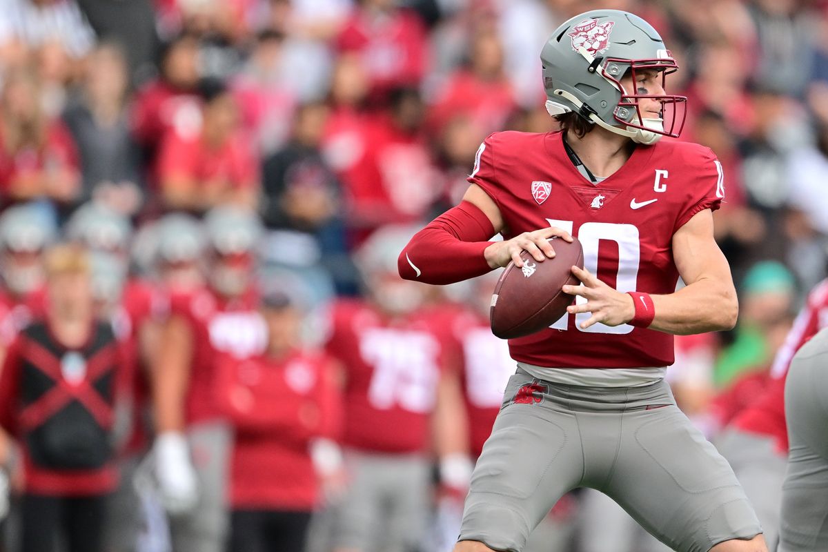 Washington State quarterback John Mateer prepares to throw against Hawaii during the first half last Saturday at Gesa Field in Pullman.  (Tyler Tjomsland/The Spokesman-Review)