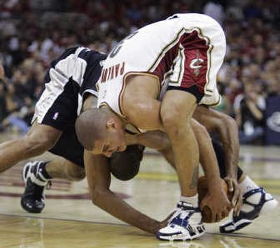 
Tim Duncan, background, and the Spurs have Sasha Pavlovic and the young Cavaliers in a tough spot. Associated Press
 (Associated Press / The Spokesman-Review)