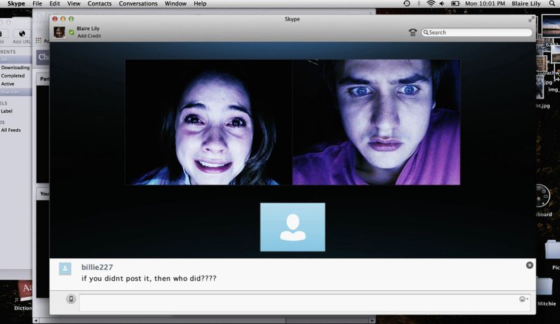 Shelley Henning, left, and Moses Storm appear in a scene from “Unfriended,” which is viewed entirely through computer screens.