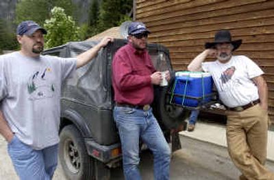 
Alterra Mine employees Pat Baldwin, Rich Babin and Mike Thomas hang out outside the Prichard Tavern and talk about what they're going to do after a month without pay or promised benefits from the startup placer gold-mining operation along Prichard Creek in Shoshone County. Alterra Mine employees Pat Baldwin, Rich Babin and Mike Thomas hang out outside the Prichard Tavern and talk about what they're going to do after a month without pay or promised benefits from the startup placer gold-mining operation along Prichard Creek in Shoshone County. 
 (Jesse Tinsley/Jesse Tinsley/ / The Spokesman-Review)