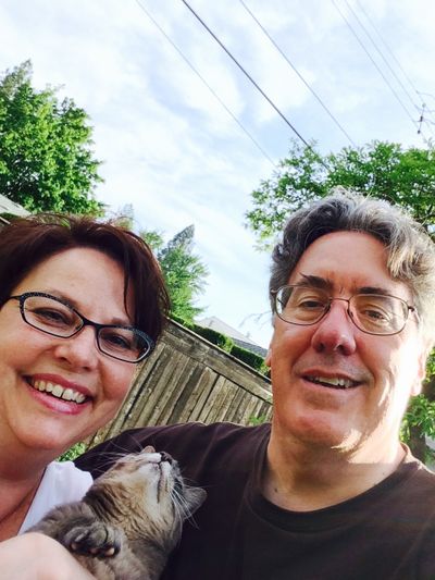 Here's Chloe being held by my neighbor about a year ago. She's keeping an eye on me in case I try something, whatever that might be.